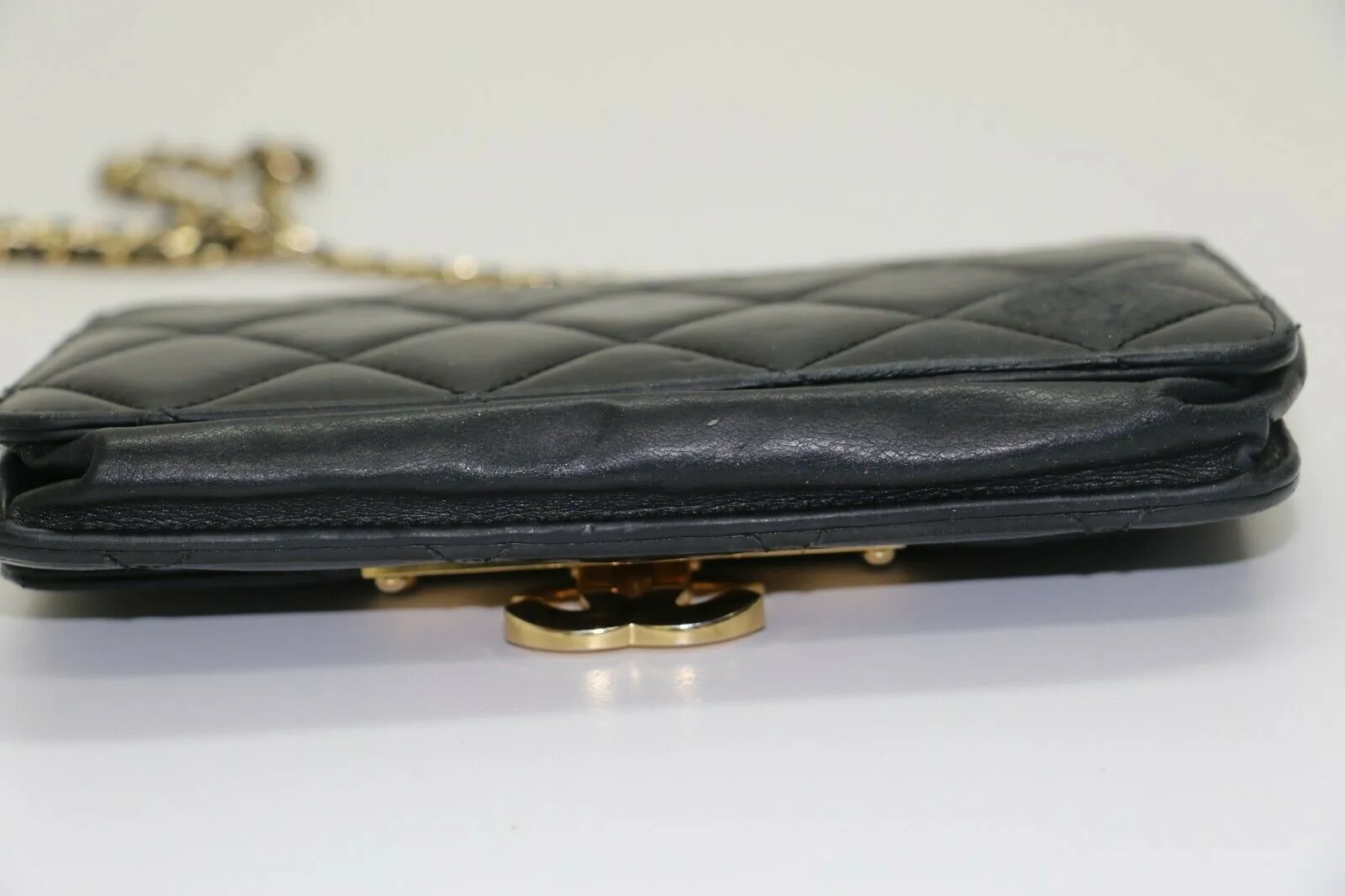 Chanel: Quilted Black Leather Chain Clutch - Flip Lock